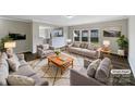 Cozy, virtually staged living room with stylish furniture and lots of natural light at 722 Ladino Ln, Clover, SC 29710