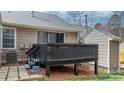 Back deck features slider access to the home, and is complimented by a walkway at 413 19Th Avenue Ne Ct, Hickory, NC 28601