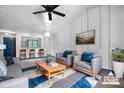 Bright living room features modern decor, stylish furniture, and lots of natural light at 413 19Th Avenue Ne Ct, Hickory, NC 28601
