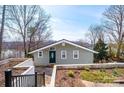 Charming exterior of home with garden, concrete landscape features and front door at 4846 Midway Sand Rd, Hickory, NC 28601