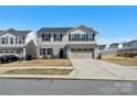 Charming two-story home with a spacious two-car garage, and inviting curb appeal at 8010 Bruce St, Charlotte, NC 28215