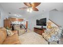 Open concept living room, with ceiling fan, flowing into the kitchen area at 102 Brandywine Ne Dr # Q4, Conover, NC 28613