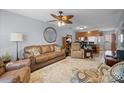 Comfortable living room, flowing into the kitchen area, with hardwood-style flooring at 102 Brandywine Ne Dr # Q4, Conover, NC 28613