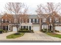 Attractive townhome exterior featuring black shutters, manicured landscaping, and private drive at 187 Snead Rd, Fort Mill, SC 29715