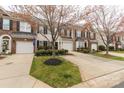 Exterior view of several townhomes featuring well-kept lawns and private driveways at 187 Snead Rd, Fort Mill, SC 29715