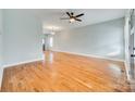 Spacious living room featuring gleaming hardwood floors and ample natural light at 7 Private St, York, SC 29745