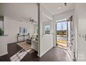 Bright foyer with hardwood floors, open layout, and a view into the spacious living area at 11332 Westbranch Pkwy, Davidson, NC 28036
