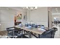 Bright dining area with modern table setting and chair styling, plus great natural light at 132 Asmodean Ln, Troutman, NC 28166