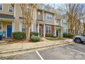 Well-maintained townhome exterior with neat landscaping, brick accents, and easy parking access at 8364 Chaceview Ct, Charlotte, NC 28269