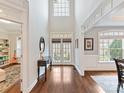 Bright foyer with hardwood floors, high ceilings, and elegant decor, offering a welcoming entrance at 1110 Woodhall Dr, Huntersville, NC 28078