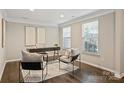 Bright office space with hardwood floors, modern furnishings, and neutral wall paint at 1317 Queen Lyon Ct, Charlotte, NC 28205