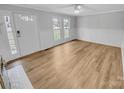 Spacious living room featuring lots of natural light and attractive flooring at 279 Timberland Loop, Mooresville, NC 28115