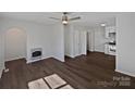 Bright living room with hard surface floors, and ceiling fan at 426 W Ballard St, Cherryville, NC 28021