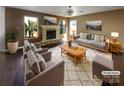 Inviting living room with stone fireplace, neutral decor, and plenty of natural light at 4608 Oakburn Dr, Charlotte, NC 28269