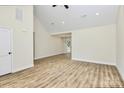 Open concept living room boasting vaulted ceilings, recessed lighting, and beautiful wood-look flooring at 914 Saluda St, Rock Hill, SC 29730