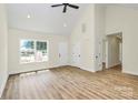 Bright living room with high ceilings, wood floors, neutral walls, and lots of natural light at 914 Saluda St, Rock Hill, SC 29730