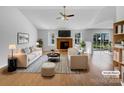 Bright living room with fireplace and modern furnishings at 1025 Ridgefield Cir, Indian Trail, NC 28079