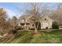 Attractive home featuring a blend of stone and siding, with a welcoming front porch at 3196 Stonemill Path, Sherrills Ford, NC 28673
