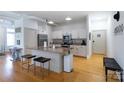 Modern kitchen with stainless steel appliances and a stone island counter at 404 N Laurel Ave # 12, Charlotte, NC 28204