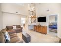 Spacious living room with carpet flooring, staircase, and view to main bedroom at 7361 Sun Dance Dr, Fort Mill, SC 29707
