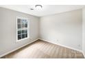 Carpeted bedroom featuring a double-hung window offering outdoor views at 755 Ottawa Dr, Rock Hill, SC 29732