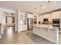 Stylish kitchen with white cabinets, granite countertops, and stainless steel appliances at 120 Hornbeam Ln, Mooresville, NC 28117