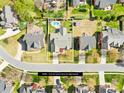 Aerial view shows the home, the pool, and the surrounding neighborhood at 127 Oxford Dr, Mooresville, NC 28115