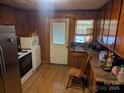 Functional kitchen featuring a stainless steel refrigerator and ample counter space at 2039 Garland Ave, Gastonia, NC 28052