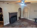 Spacious living room with brick fireplace and hardwood floors at 2039 Garland Ave, Gastonia, NC 28052