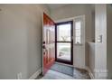 Inviting entryway featuring a view to the front yard and new flooring at 10071 Highland Creek Cir, Indian Land, SC 29707