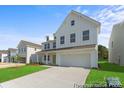 Stunning two-story home with a well-manicured lawn, attached two-car garage and covered porch at 2308 Bulwarks Ct # 8P, Albemarle, NC 28001