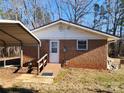 Brick house with a ramp leading to the back door, offering accessibility and convenience at 2333 Howells Ferry Rd, Hickory Grove, SC 29717