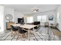 Contemporary dining area with an open floorplan and modern décor at 5524 Howard St, Charlotte, NC 28269