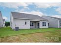 Well maintained backyard, showing ample green space, perfect for outdoor activities at 5613 Skinny Dr, Charlotte, NC 28215