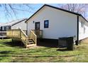 Home showcasing a newly constructed deck and stairs leading to a lawn at 621 Cauthen St, Rock Hill, SC 29730