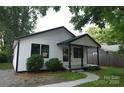 Charming home featuring a front porch and a well-maintained front yard at 621 Cauthen St, Rock Hill, SC 29730