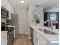 Well-equipped kitchen with stainless steel appliances, ample counter space, and modern fixtures, ready for cooking at 419 W 8Th St, Charlotte, NC 28202