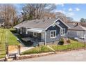 Charming single-story home with a fenced yard and a welcoming front porch at 512 Washington St, Cramerton, NC 28032