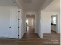 Bright hallway with wood floors leading to other rooms at 263 Luray Way # 444, Rock Hill, SC 29730