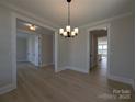 Bright dining room features modern flooring and modern light fixture at 267 Luray Way # 445, Rock Hill, SC 29730