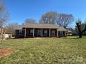 Attractive brick home with classic architectural details and a well-maintained lawn at 3660 9Th Street Ne Dr, Hickory, NC 28601