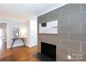 Stylish living room featuring a modern fireplace and sleek decor at 4717 Doris Ave, Charlotte, NC 28205