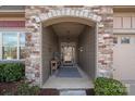 Inviting entryway featuring stone archway, charming decor, creating a warm welcome into the home at 5136 Samoa Ridge Dr, Lancaster, SC 29720