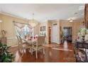 Bright dining area showcasing elegant furniture and natural light at 12502 Bending Branch Rd, Charlotte, NC 28227