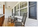 Inviting front porch with rocking chairs, perfect for relaxing and enjoying the outdoors at 301 N 4Th Ave, Maiden, NC 28650