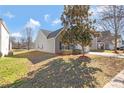 A well-maintained lawn surrounds this home featuring a harmonious blend of brick and siding, creating an inviting outdoor space at 1911 Kingstree Dr, Monroe, NC 28112