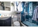 Modern bathroom featuring a glass enclosed shower and sleek black accents at 3230 Creek Bend Ct, Sherrills Ford, NC 28673