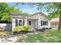 Attractive single Gathering home with a gray exterior, manicured front yard and a welcoming walkway at 1509 Harrill St, Charlotte, NC 28205