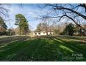 Expansive backyard with mature trees at 1909 Stokes Ferry Rd, Salisbury, NC 28146