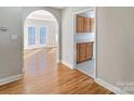 Open floor plan with hardwood floors looking into the kitchen at 9530 Driftwood Ct, Hickory, NC 28601